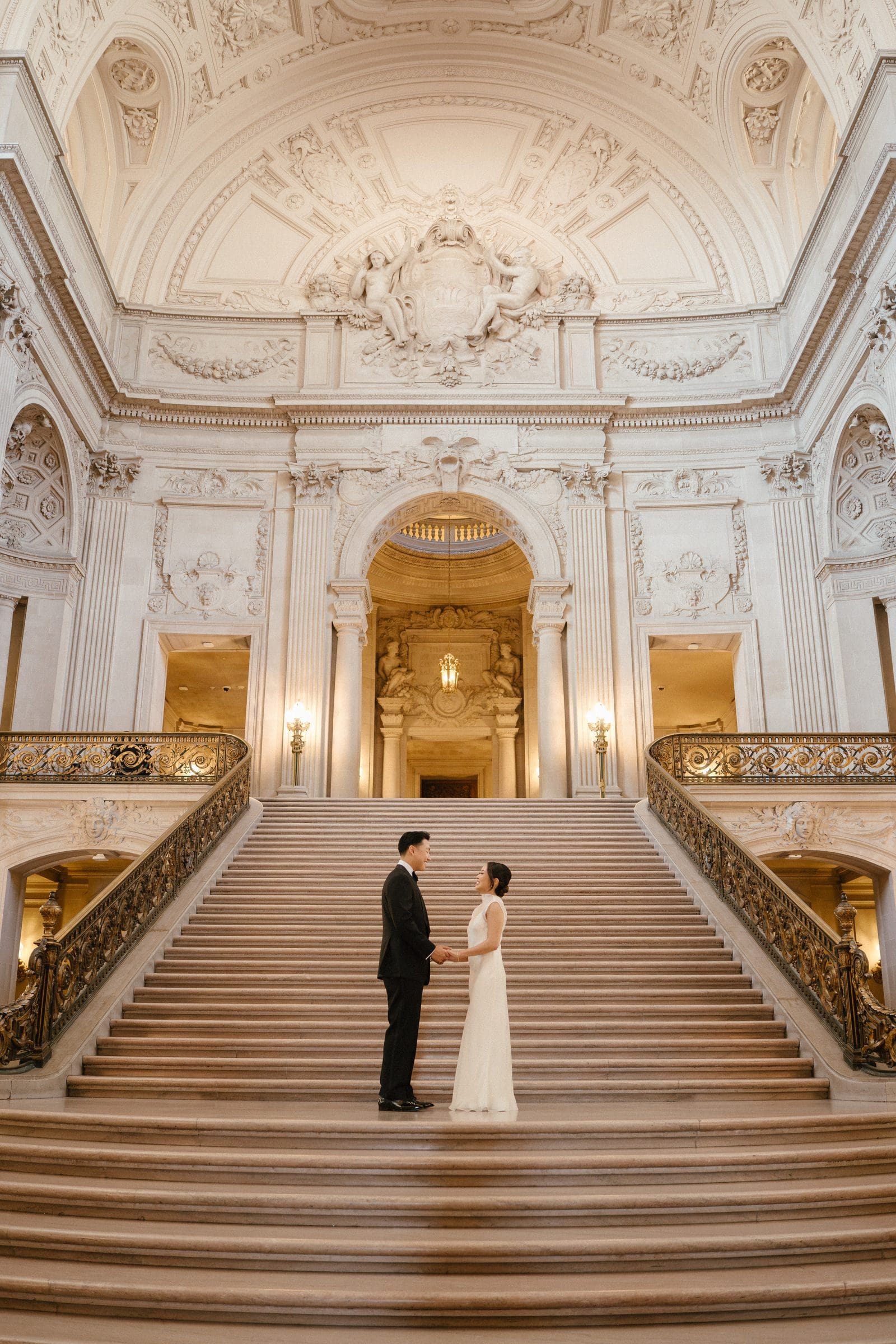 David and Michelle on the grand staircase at San Francisco City Hall