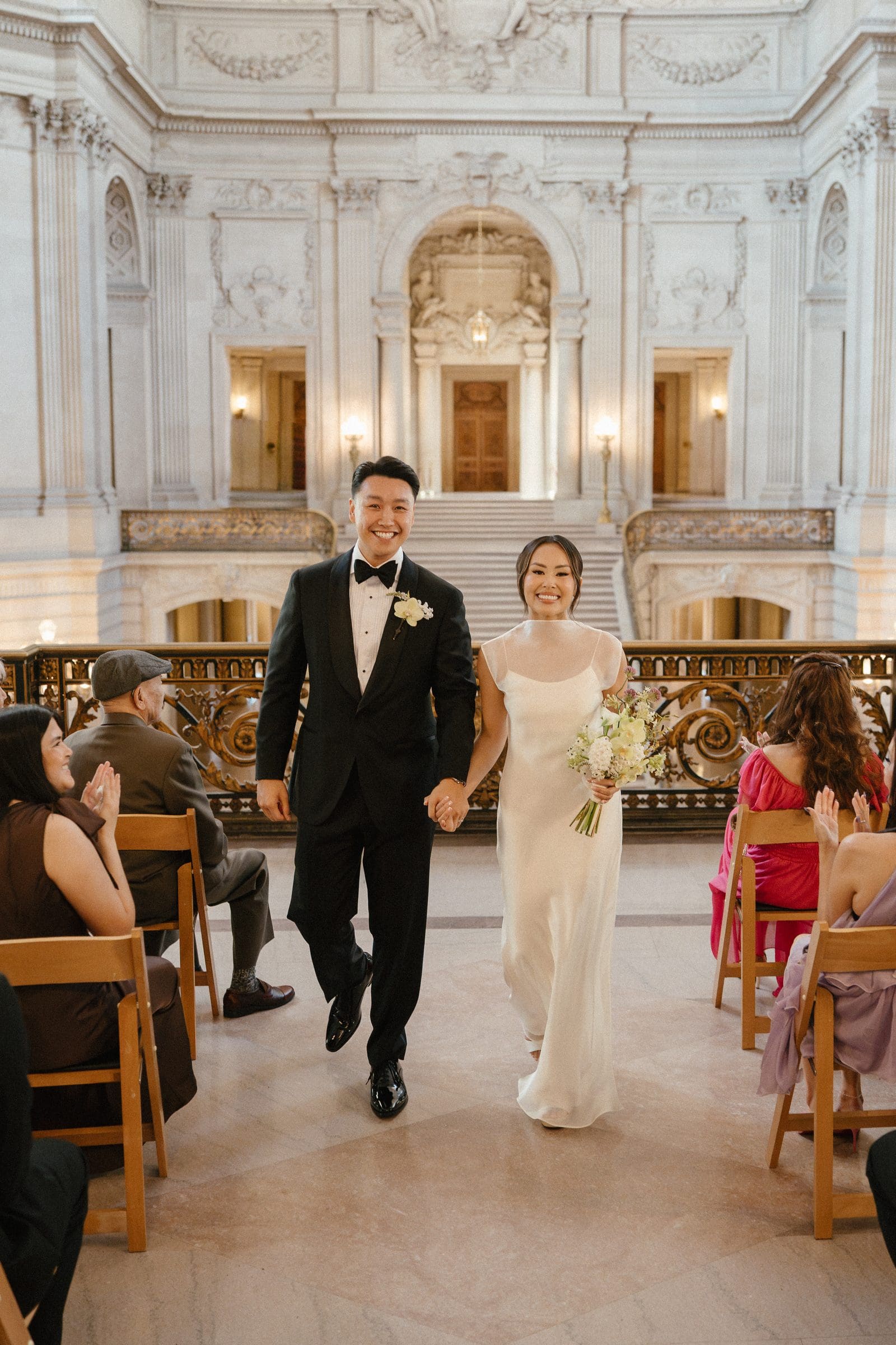 David and Michelle walking back down the aisle