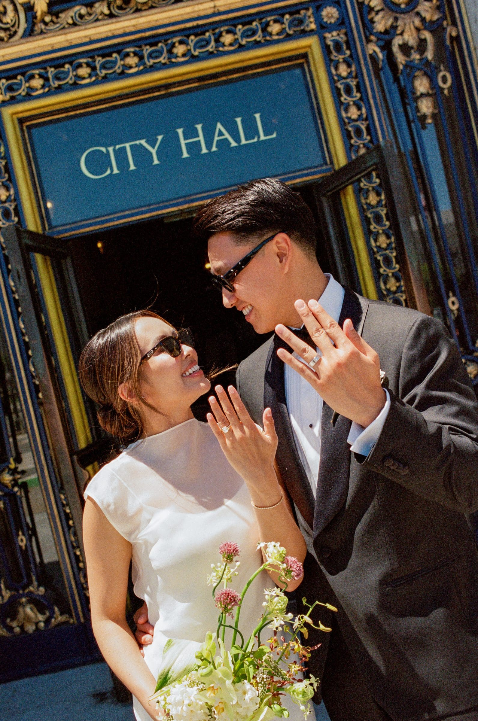 David and Michelle under the City Hall sign, on film