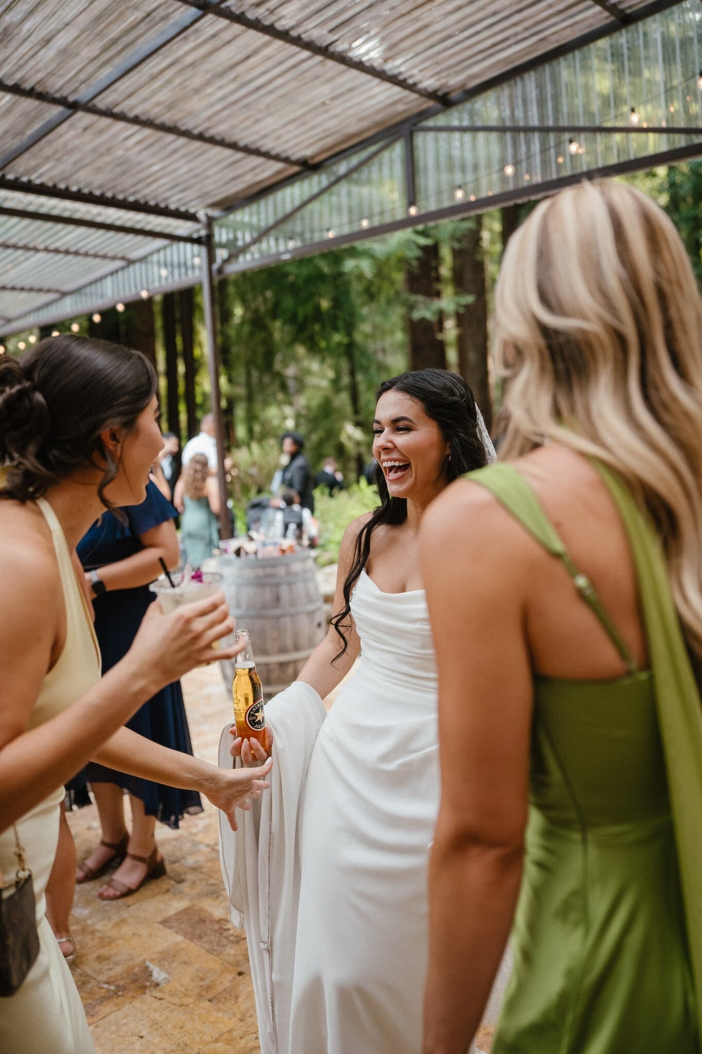 Sofia laughing with friends during cocktail hour