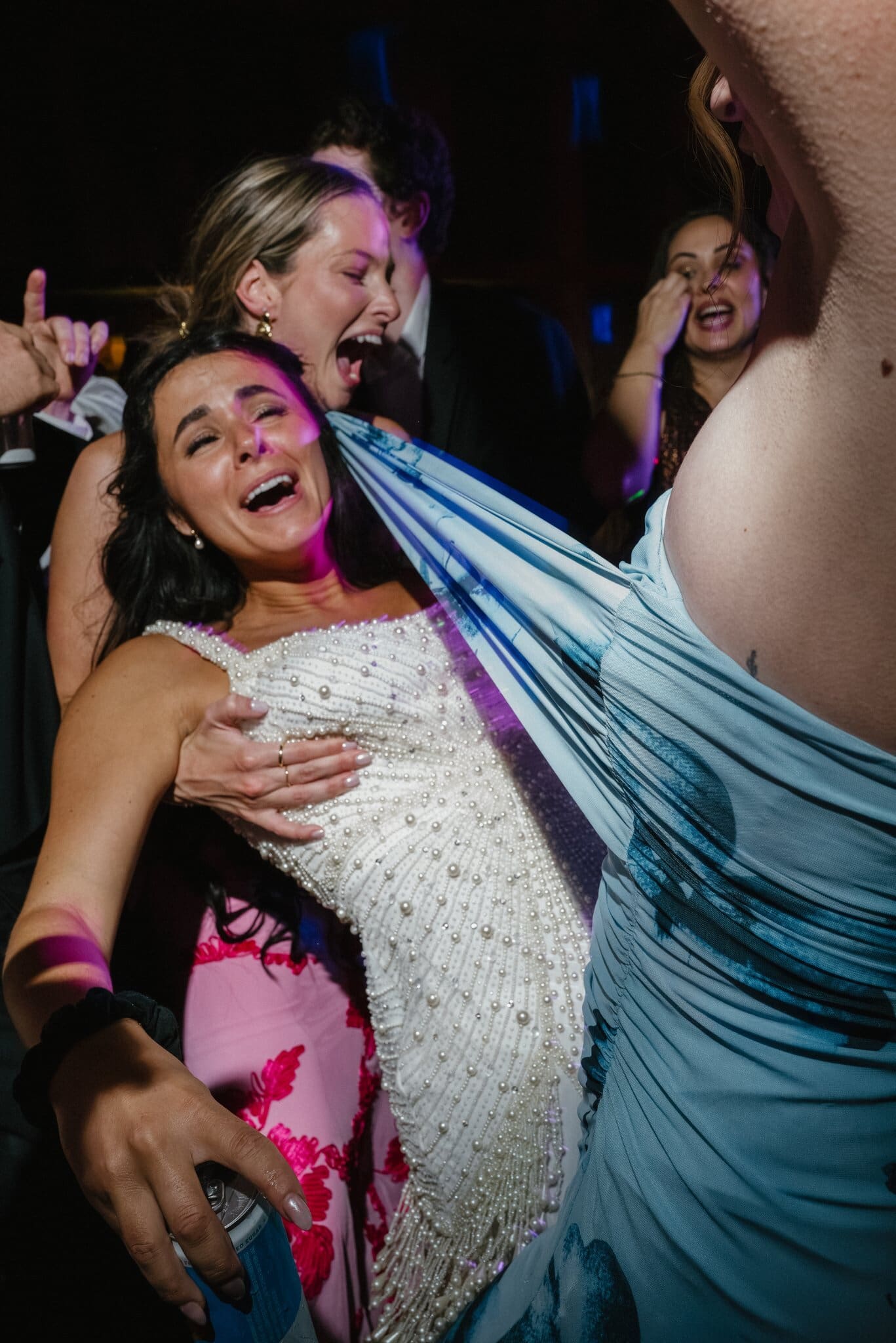 Sofia celebrating with friends on the dance floor