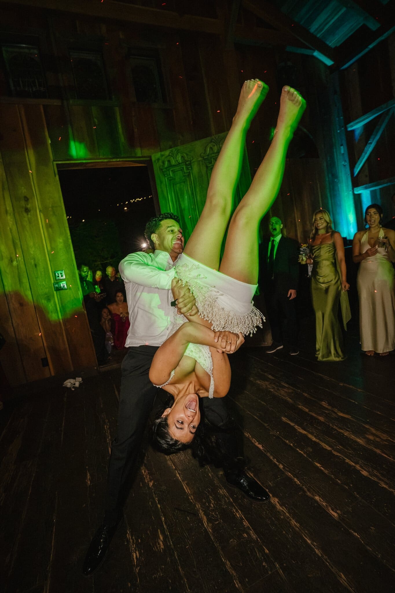 Devin flipping Sofia upside down on the dance floor