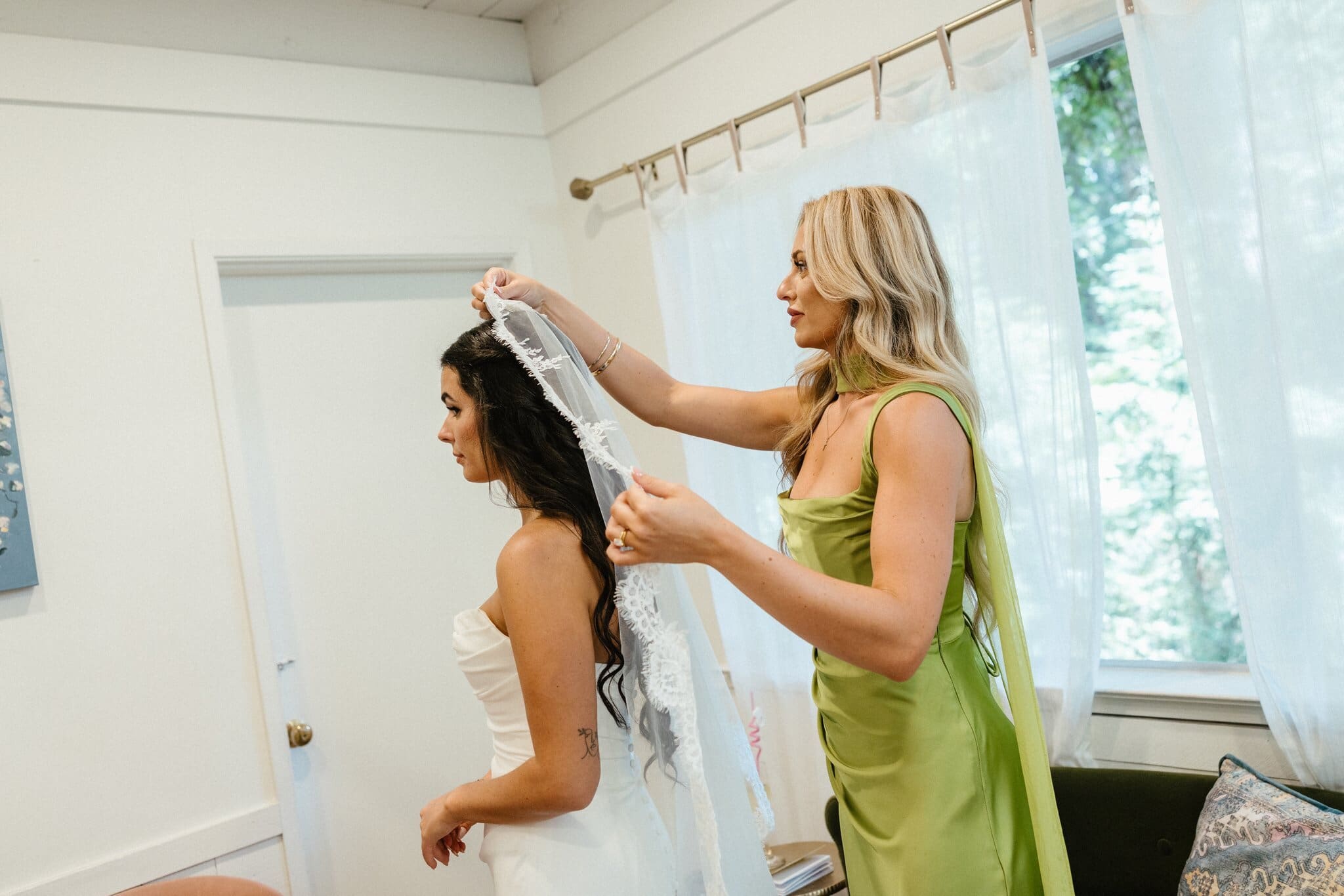 Bridesmaid placing Sofia's veil before the ceremony