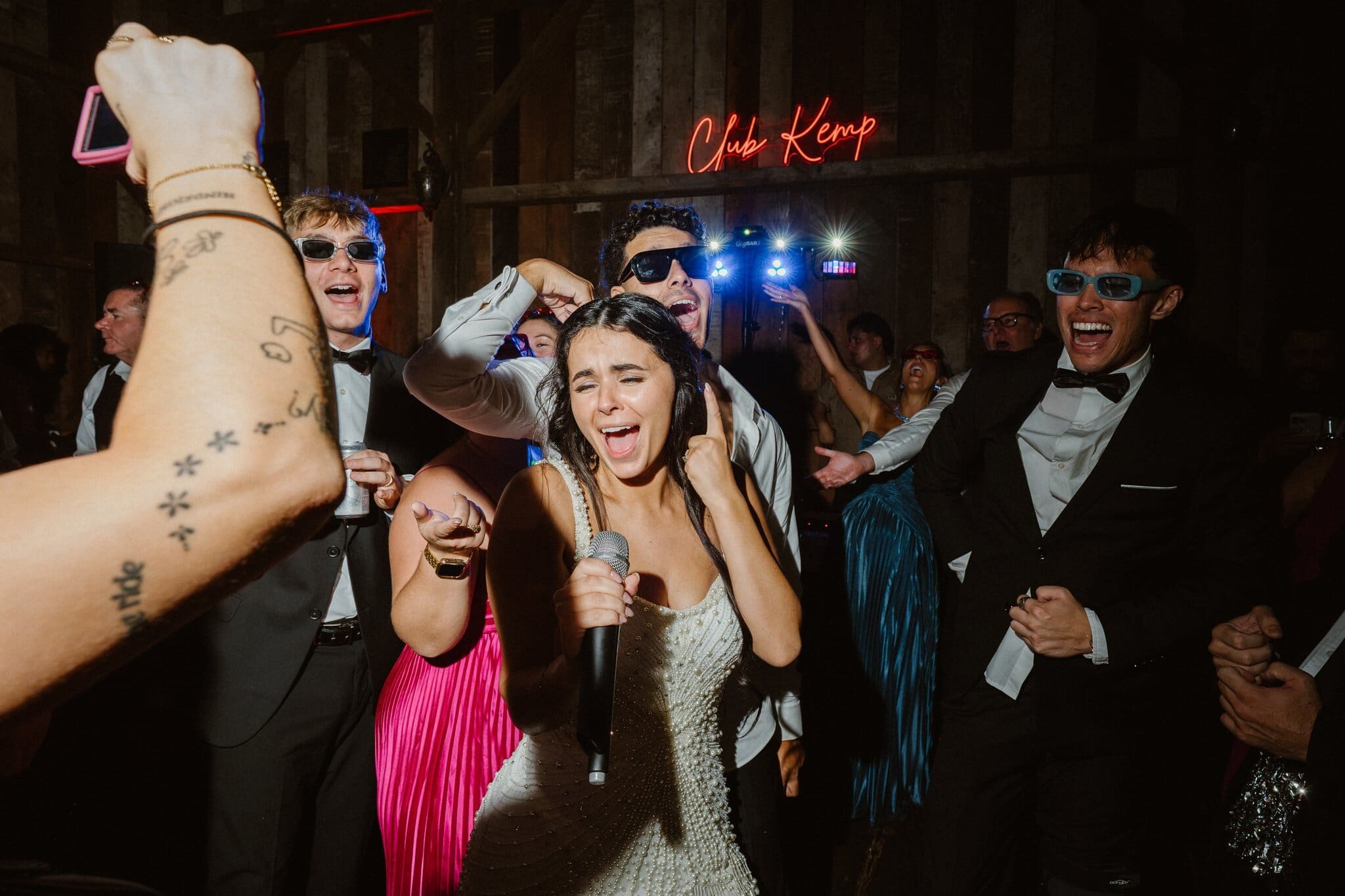 Sofia singing with friends as the party starts