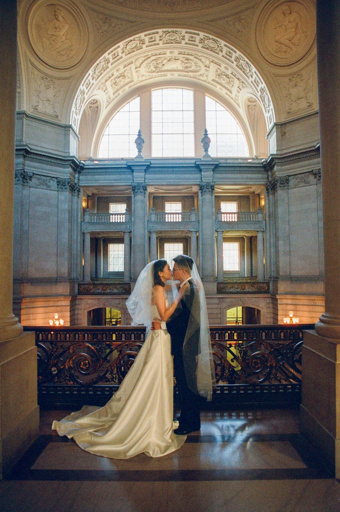 Hsiang and Ting on a City Hall balcony, on film