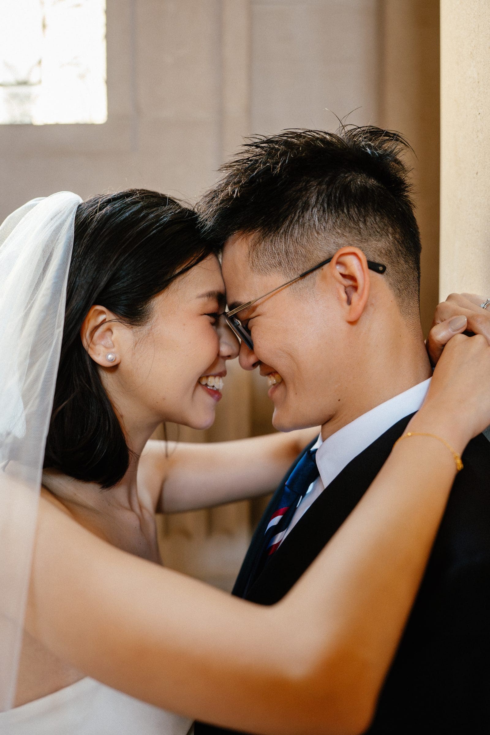 Hsiang and Ting touching foreheads under her veil