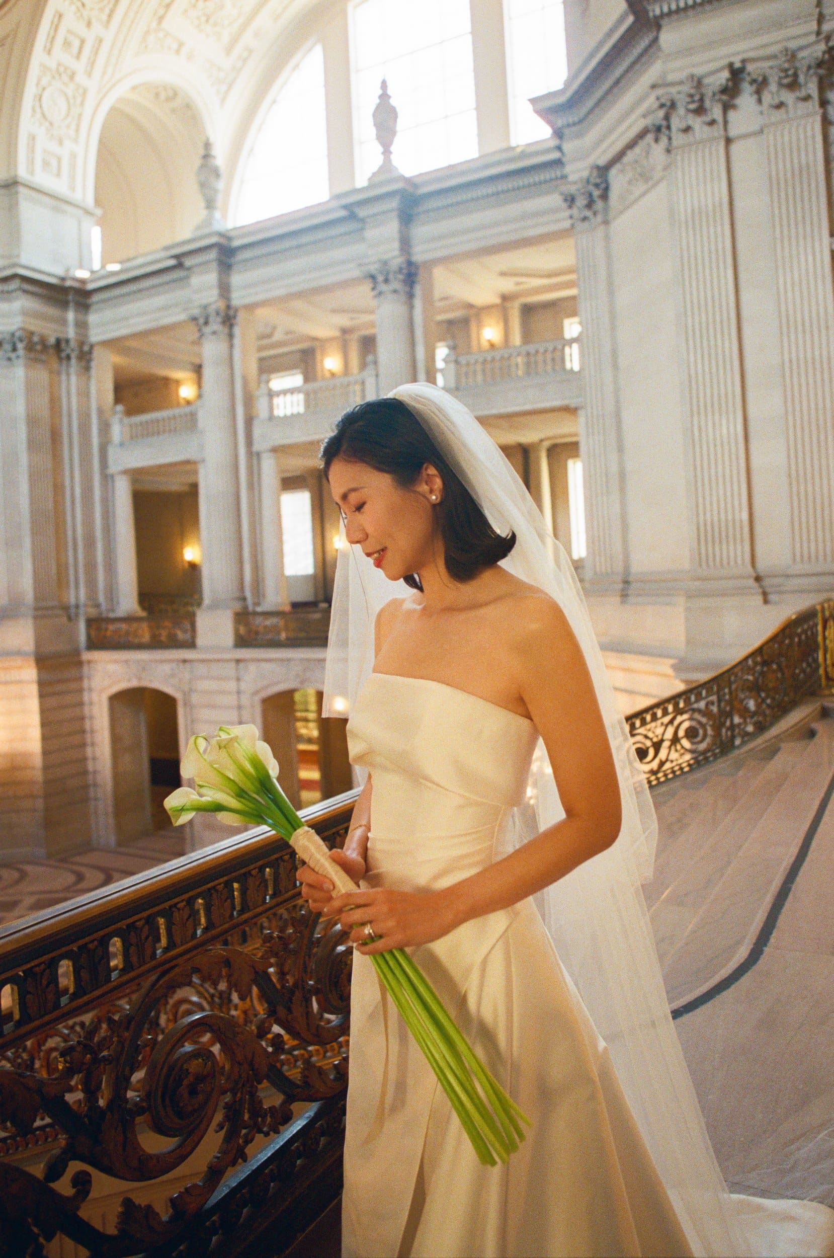 Ting with her calla lilies on a City Hall balcony, on film