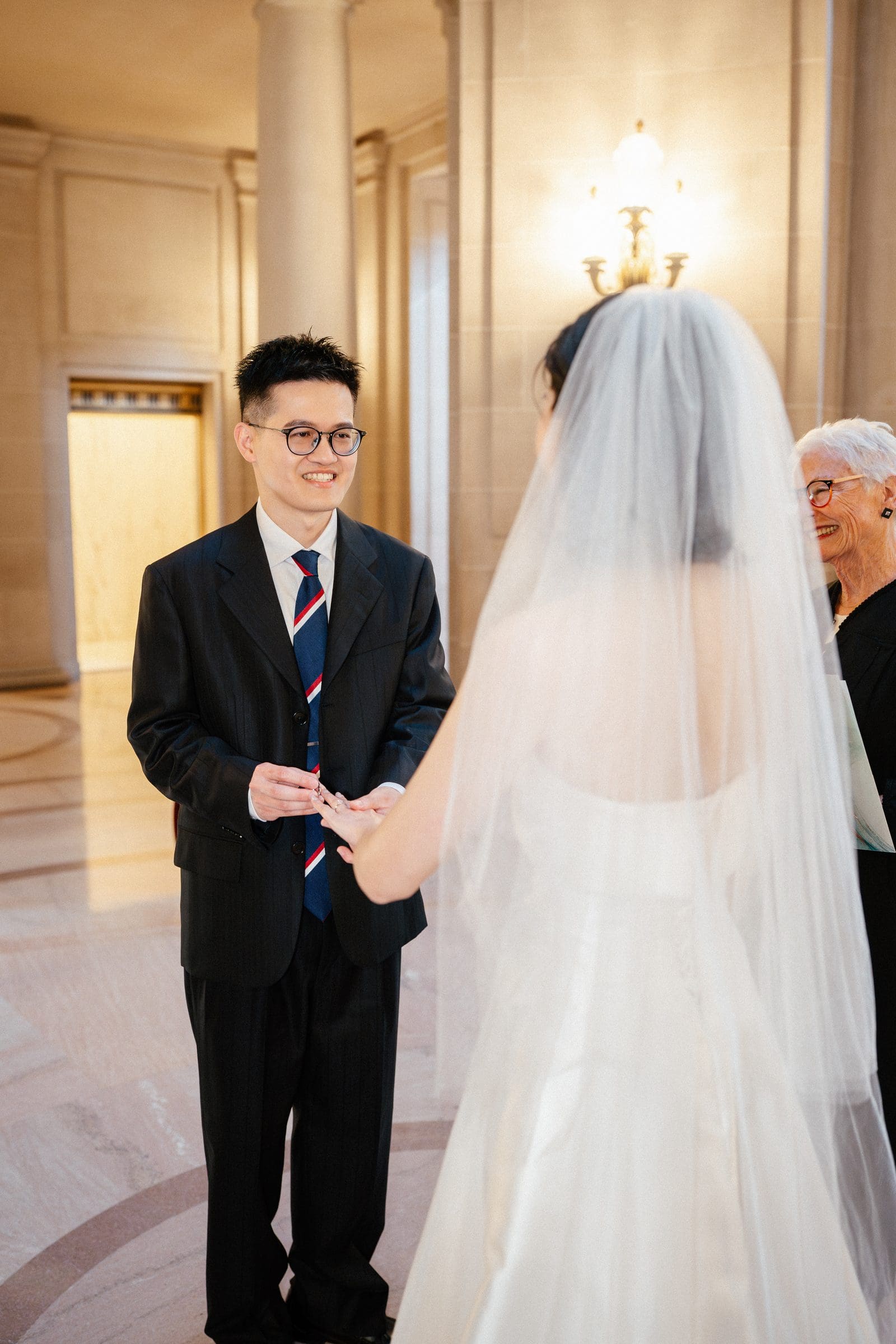 Hsiang smiling at Ting during the ceremony