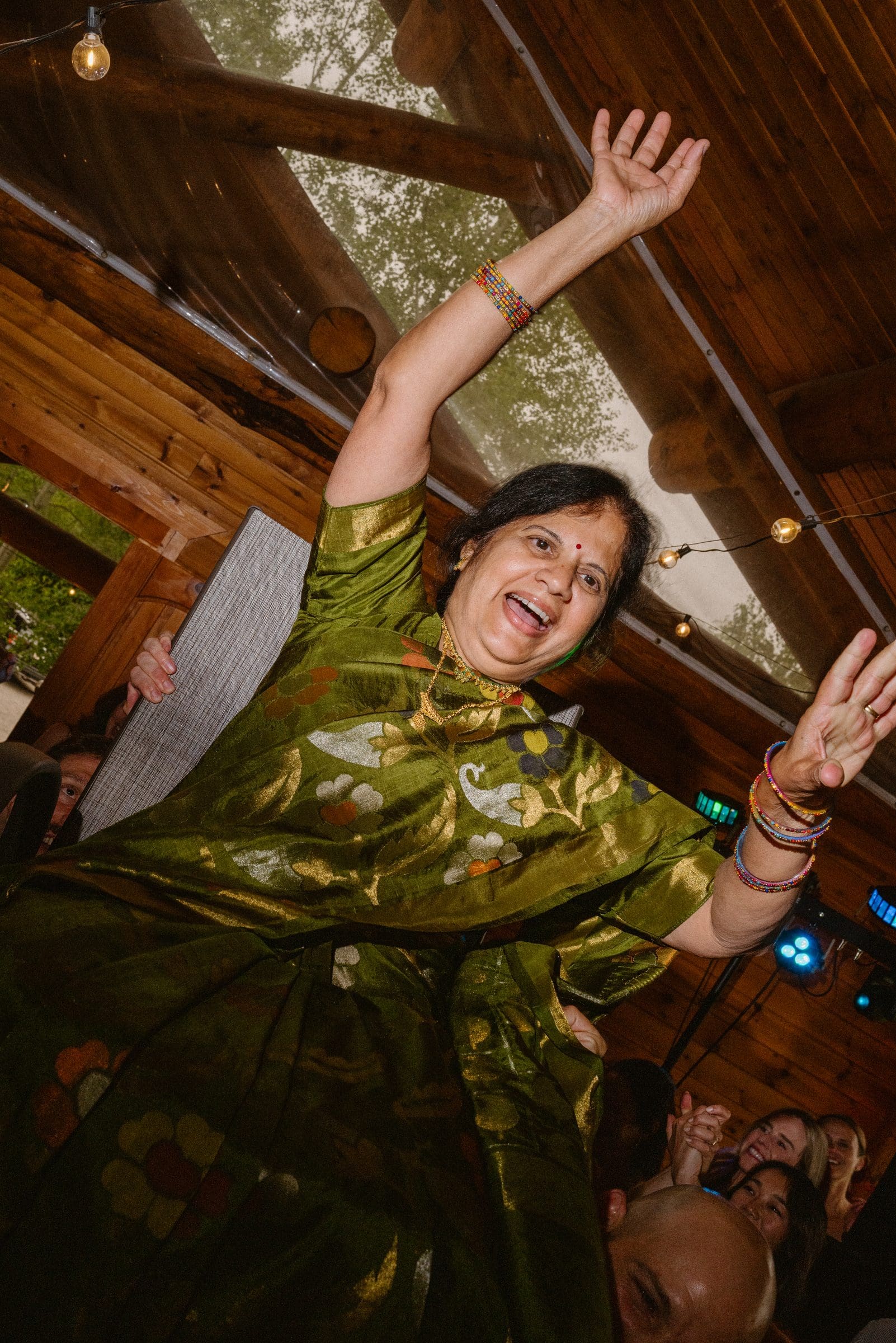 A guest dancing at the reception