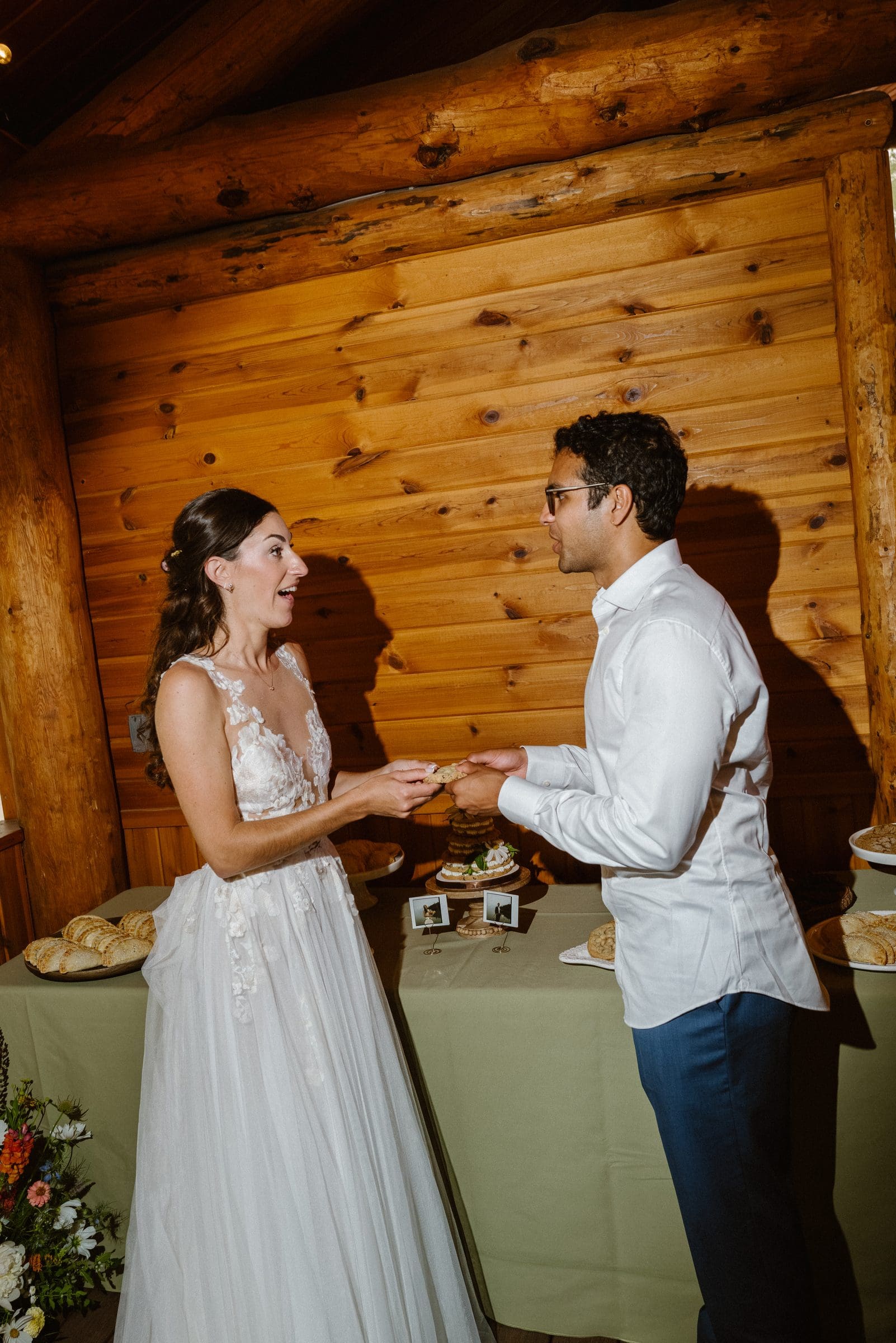 Raj and Isabelle at the cake table