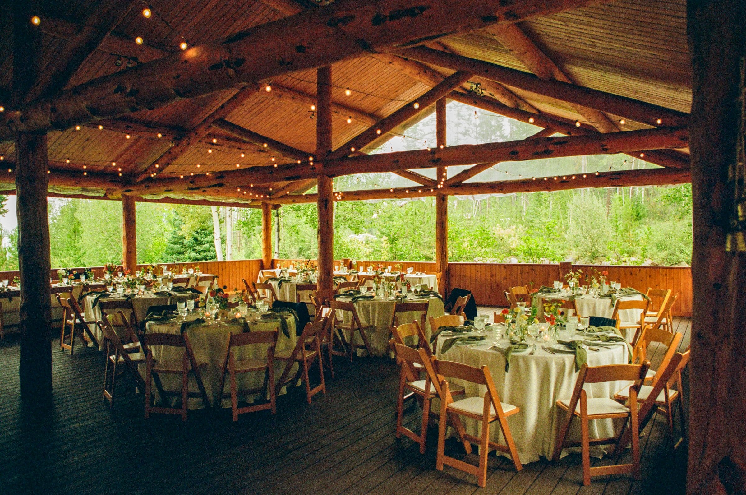 The timber pavilion set for the reception at Lake McDonald, on film